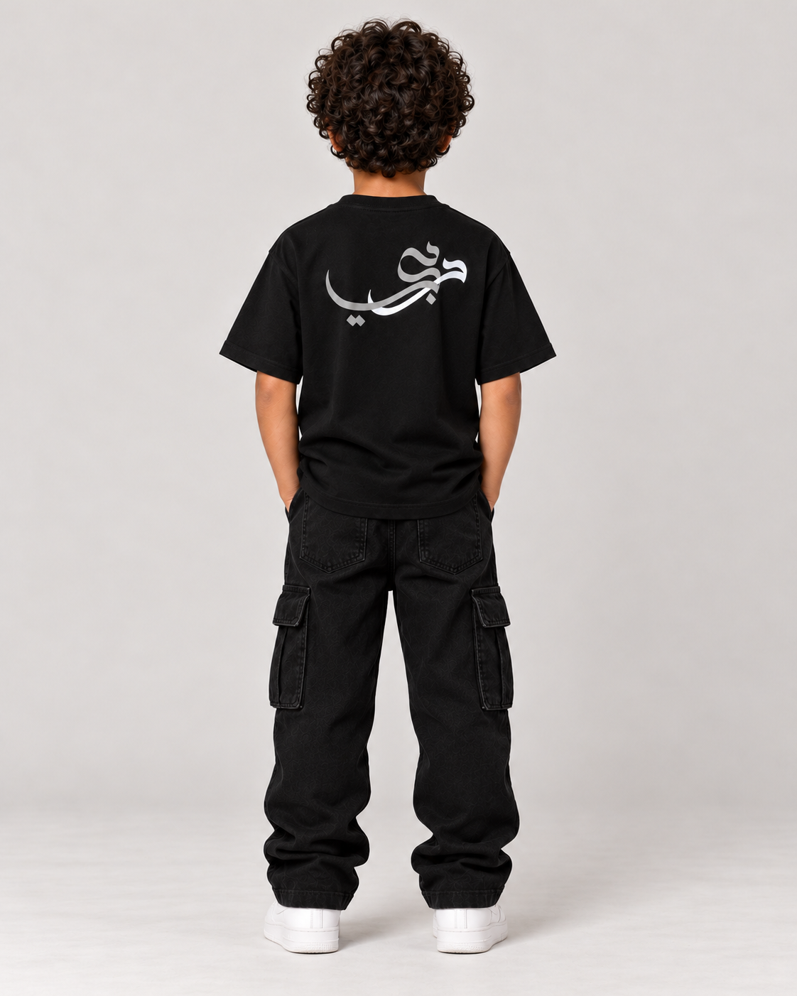 Kids Born in Dubai T-Shirt in Black – back, Arabic Dubai calligraphy