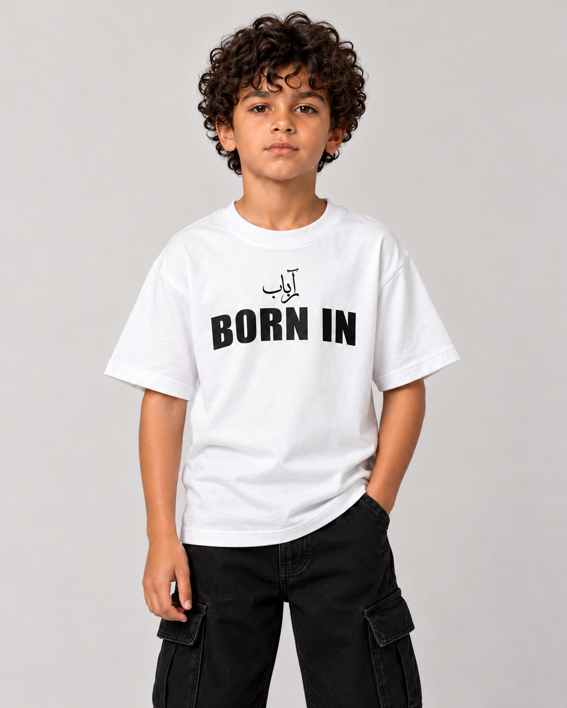 Kids Born in Dubai T-Shirt in White – front, BORN IN print