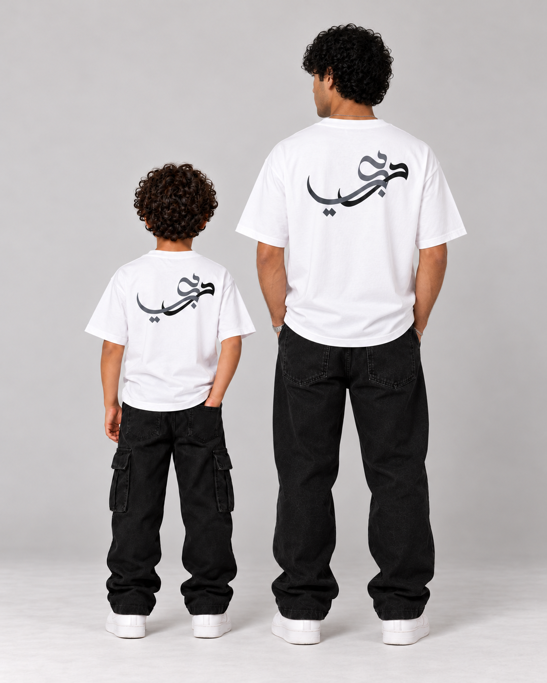 Kids Born in Dubai T-Shirt in White – matching back calligraphy with adult tee